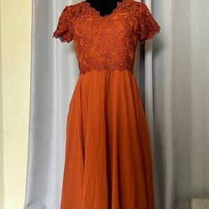 Burnt orange festive dress in size M